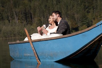 Wedding couple in a rowboat
