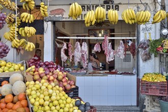 Butcher shop with fruit stand