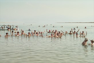 Tourists bathing in the Dead Sea