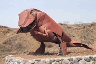 Dinosaurs statue from metal parts