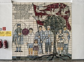 Mural of tiles with saying by Walter Ulbricht