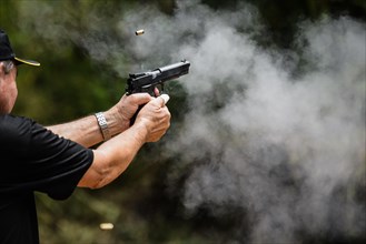 Man shooting a gun