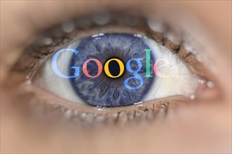 Blue eye with the Google logo on iris