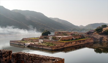 Kesar Kyari Bagh palace gardens in the lake