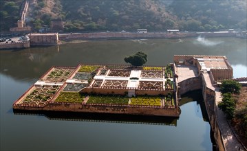 Kesar Kyari Bagh palace gardens in the lake