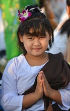 Praying girl at the Bigboon pilgrims' procession