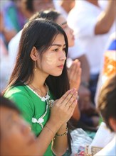 Praying woman at the Bigboon pilgrims' procession