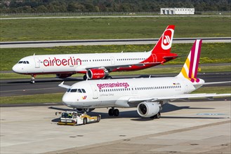 Air Berlin Airbus A321 and German Wings Airbus A320 on the runway