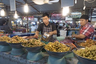 Market stall with pickled Thai fruits
