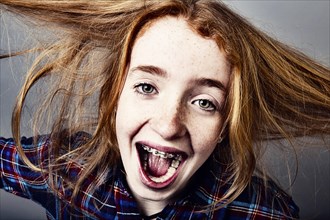 Naughty screaming red-haired girl