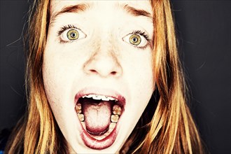 Screaming red-haired girl