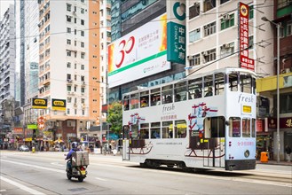 Double-Decker tram passing on Hennessy Road