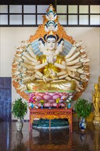 Many-armed Buddha statue at Linh An Pagoda or Chua Linh An