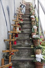Stairs with crosses and flowers