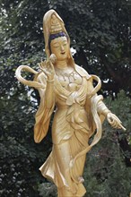 Statue of the Buddhist goddess Gunayin or Kwan Giu or Kwun Yam