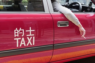 Red Hong Kong taxi