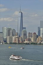 Freedom Tower and tourist boat