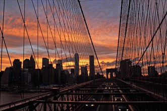 Brooklyn Bridge and Manhattan skyline at sunset