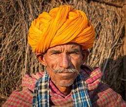 Portrait of Rajasthani man with a yellow turban