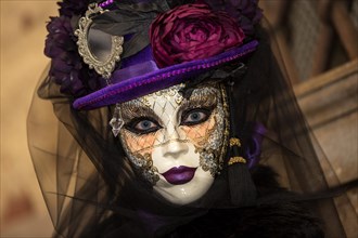 A woman dressed up for carnival in Venice