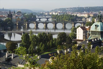 View from Letna Hill over the Vltava River bridges to the historic centre with bridge tower