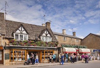 Tourists on High Street at Bourton-on-the-Water