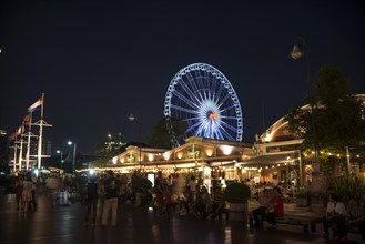 Asiatique Riverfront promenade with Ferris wheel at night