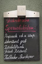 Tavern board advertising Franconian specialties