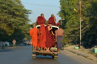 Monks on back of truck