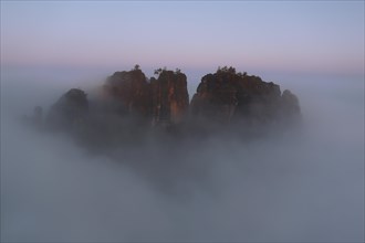 Rock formation in the morning fog