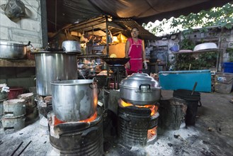 Thai woman preparing food
