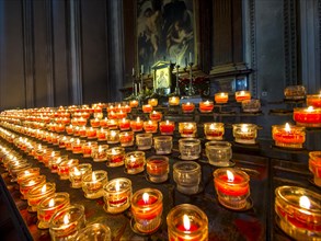 Many votive candles in Salzburg Cathedral