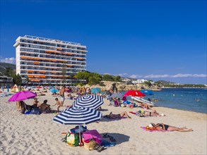 Bathers on the lively beach of Magaluf