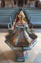 Baptismal font in the Church of St Maria