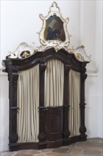 Confessional in the late Baroque monastery church