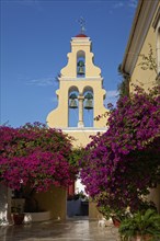Courtyard with tower and bougainvillea