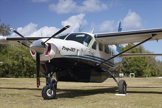 Cessna Caravan 208 Sea Air on unpaved airfield