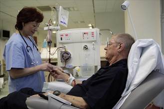 Patient and nurse during outpatient dialysis in the dialysis center of the Dominikus Krankenhaus hospital