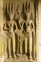 Bas-reliefs of devis on the walls of Angkor Wat
