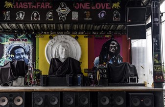 Empty stage for musicians and photos of Bob Marley