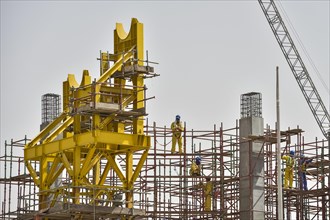 Construction workers at construction site of Khalifa International Stadium