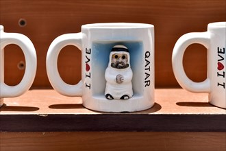 Souvenir mug with illustration of an Arab man