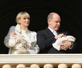Princess Charlene and Prince Albert II of Monaco presenting their twins Prince Jacques and Princess Gabrielle at the palace window to the public for the first time