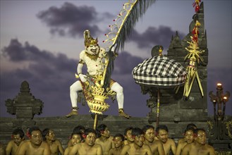 Monkey god Hanuman and dancers performing the classic Balinese Kecak Dance in Uluwatu Temple