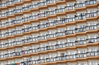 Rows of balconies on the facade of a large hotel complex in Torremolinos