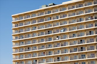 Rows of balconies on the facade of a large hotel complex in Torremolinos