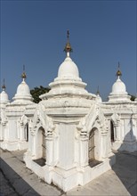 White stupas containing the world's largest book at Kuthodaw Pagoda