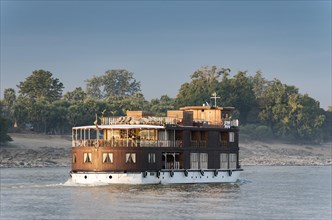 Excursion boat cruising the Irrawaddy River