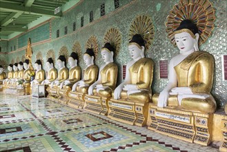 Row of statues of seated Buddhas in Umin Thounzeh