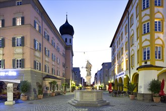 Historic residential and commercial buildings at Max-Josefs-Platz and Nepomuk fountain